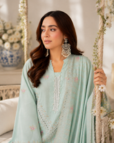 Mint green unstitched three-piece embroidered lawn suit with organza dupatta