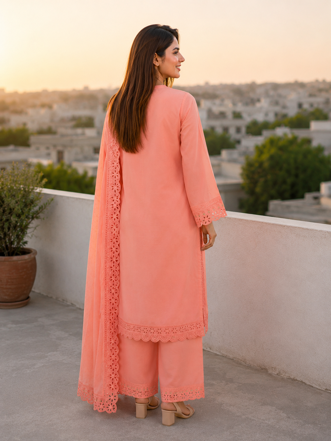 Peach three-piece luxury unstitched lawn suit for festive wear