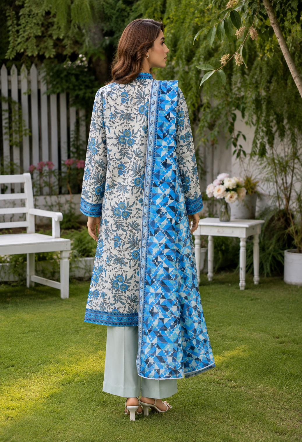 Unstitched blue and white Pakistani lawn suit with botanical floral print