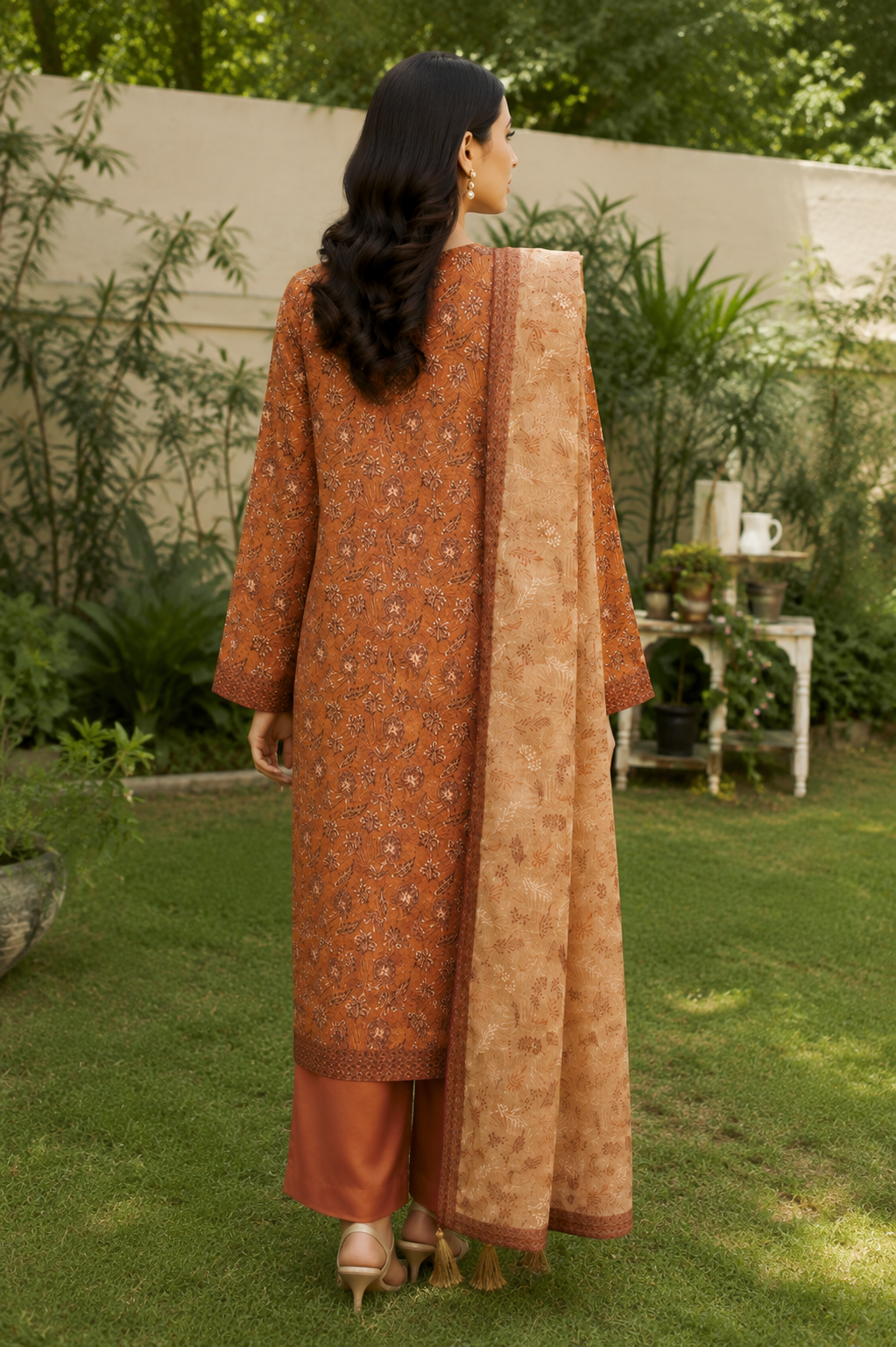 Rust brown printed 3-piece stitched suit with tassel dupatta