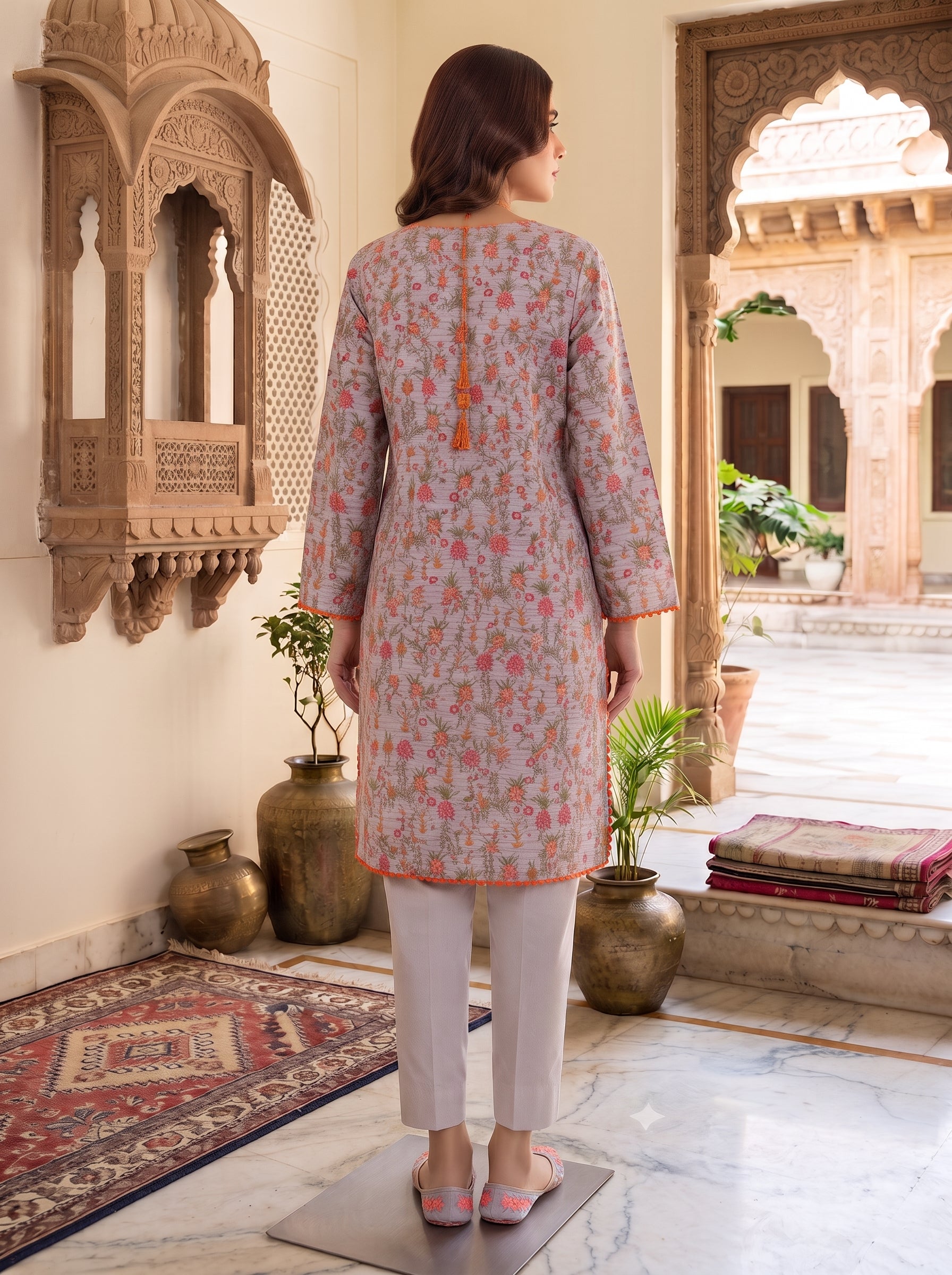 Ash grey floral print stitched suit with beaded rust tassel neckline