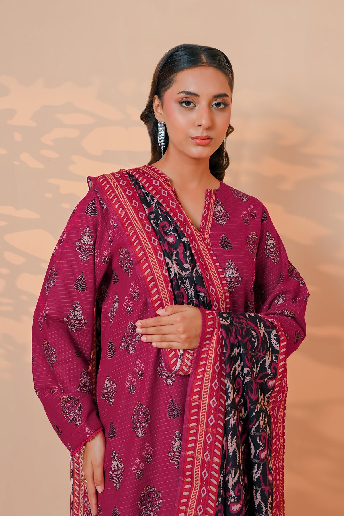 3 Pcs Unstitched printed Essential khaddar Suit in magenta-berry for women