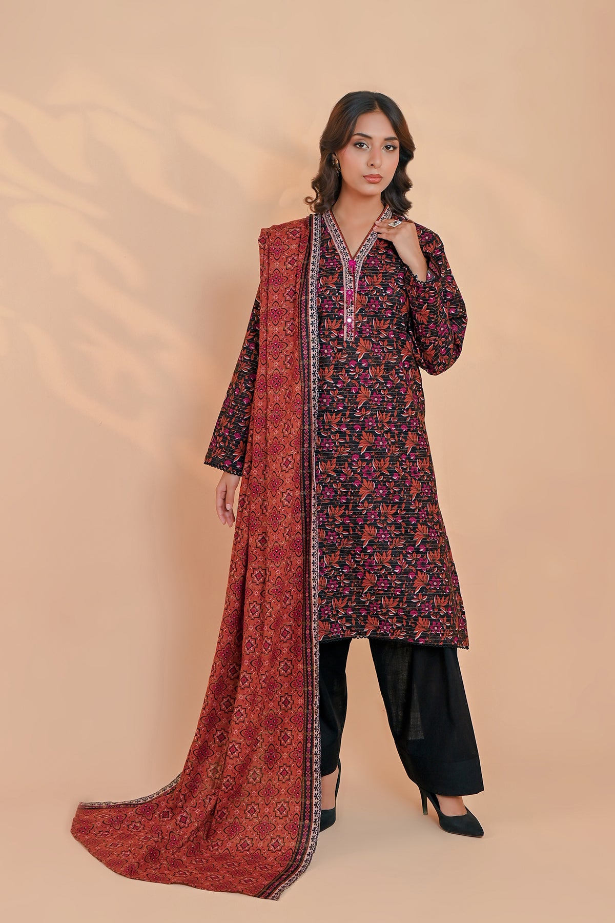 Women's blush pink unstitched khaddar suit with lace-trimmed cuffs